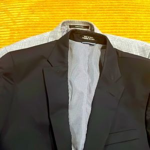 Two men’s suit jackets in great condition